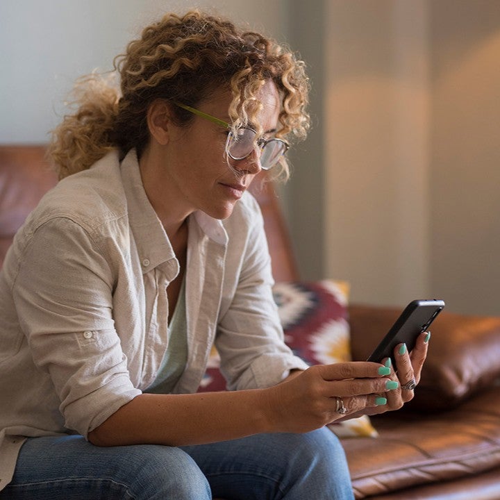Woman looking at a mobile phone